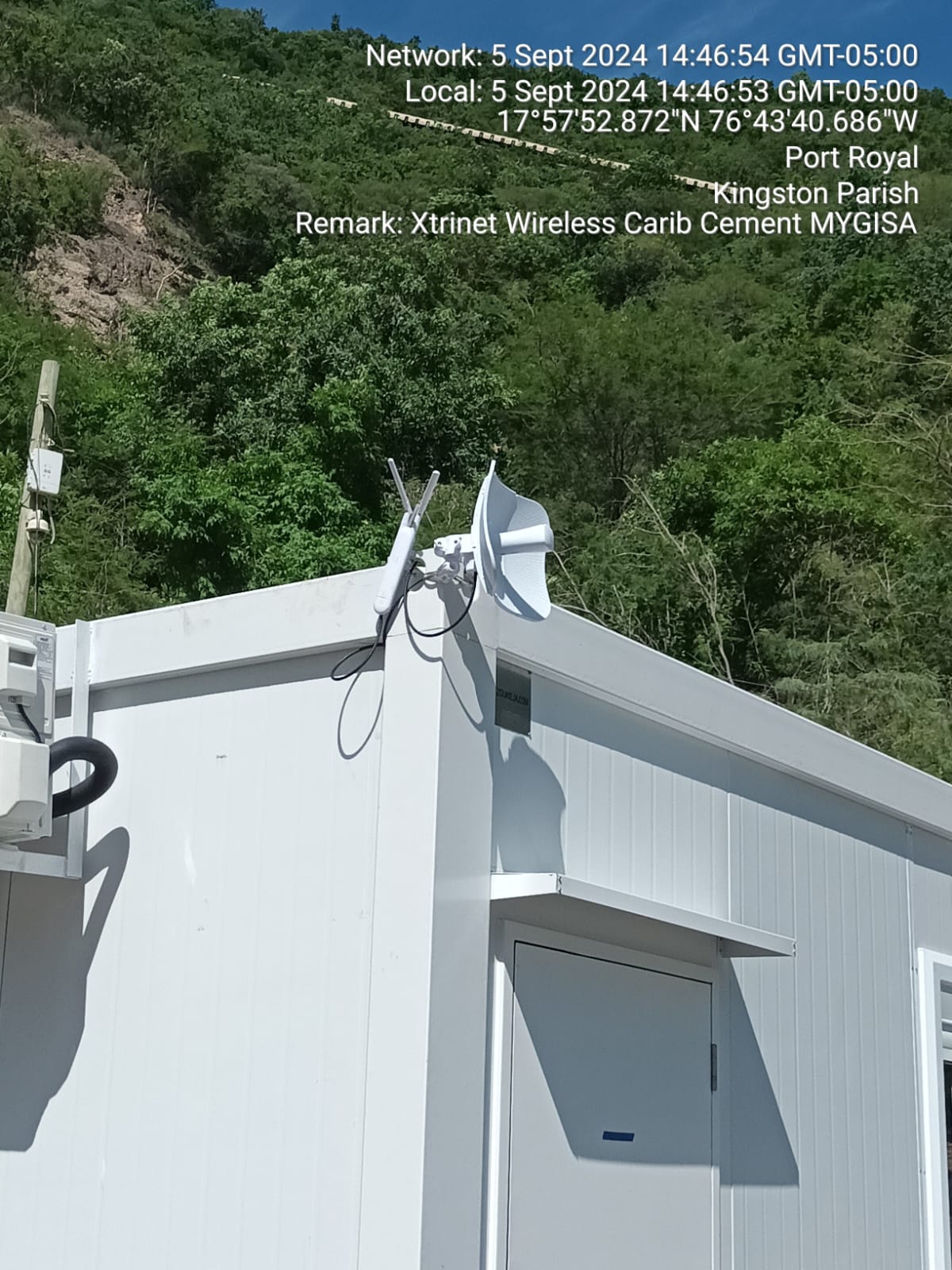 Xtrinet fixed-wireless customer-premises equipment at a private commercial site in Port Royal, Kingston